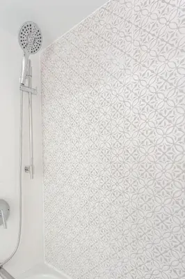 a shower in a bathroom with a white wall at Luxury 2 Bed 2 Bath Condo Downtown Vancouver with Free Parking in Vancouver