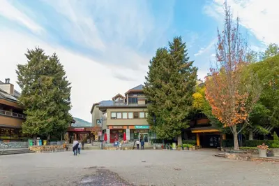 a town square with trees and a building at Black Tusk - Top Floor, Best Location, Mtn Views in Whistler
