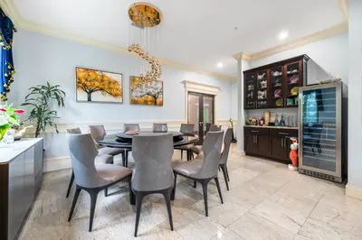 a dining room with a table and chairs at Jovehouse in Vancouver