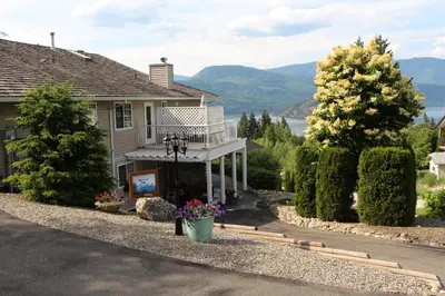 a house with a view of the water at Selah Retreat Guesthouse B&B in Sorrento