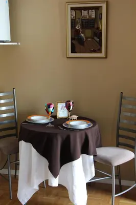 a table with two glasses of wine on it at Selah Retreat Guesthouse B&B in Sorrento