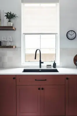 a kitchen with a sink and a window at The Brickworks at the 1896 Building in Kaslo
