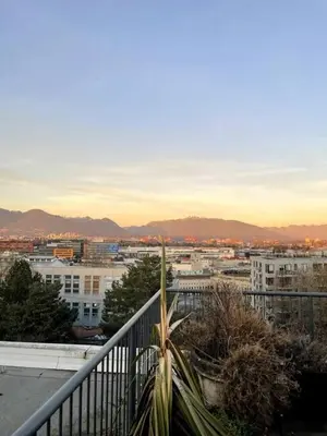 a view of a city from a balcony at Modern and Specious Condo right off Main St in Vancouver