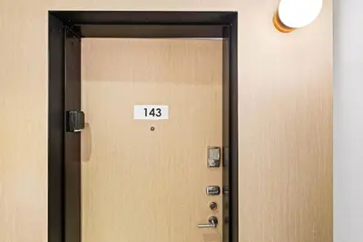 an elevator door with the number on it at Mountain Getaway in Canmore - Sleeps 6 - Pool & Hottub in Canmore