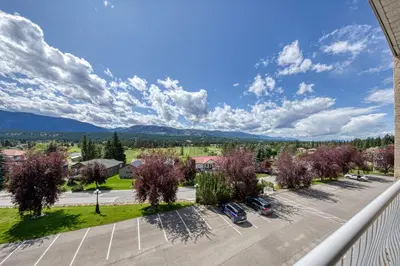 a view from a balcony of a parking lot at Mountain View Villas with Fairmont Creek Vacation Rentals in Fairmont Hot Springs