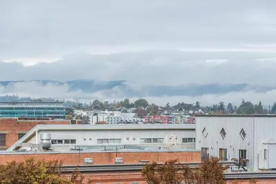 a view of a city with buildings and trees at Be The Lively Cityzen In Cityzen in Victoria