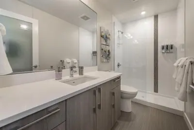 a bathroom with a sink and a toilet and a shower at Be The Civilised Cityzen In Cityzen in Victoria