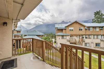 a balcony with a view of the mountains at Entire Lovely Townhouse Mountain View! in Canmore