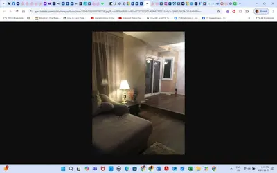 a picture of a living room with a couch in a room at Main floor room 4, 22 minute from airport in Edmonton
