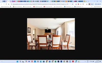 a dining room with a table and chairs at Room # 2 sleep 4 Arrangement in Edmonton