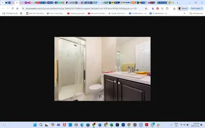 a bathroom with a shower and a toilet and a sink at Room # 2 sleep 4 Arrangement in Edmonton