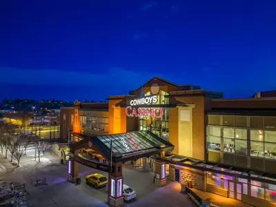 a building with a sign that reads cvs pharmacy at Poolside Bliss - 22 FL w Tower Views! FREE Banff Pass, Gym, Parking, Summer Outdoor Pool! in Calgary