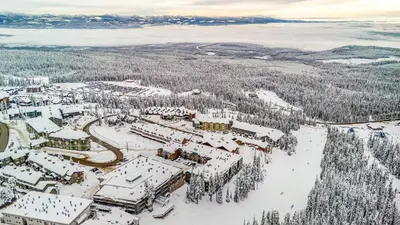 an aerial view of a resort in the snow at Winter Escape On Perfection - Ski In Out, Pool & Hot Tub in Big White