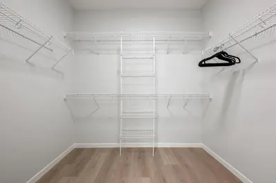 an empty room with white walls and white shelves at Very Spacious Luxury Apartment with AC, 70