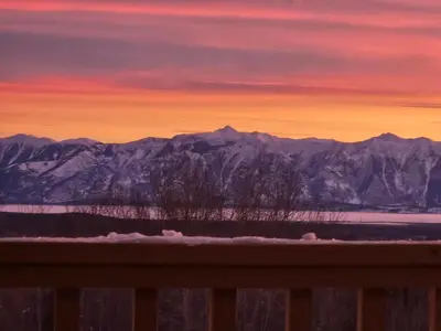 a view of a mountain range with a sunset at Mountain Escape for Ski and Golf Enthusiasts in Kimberley