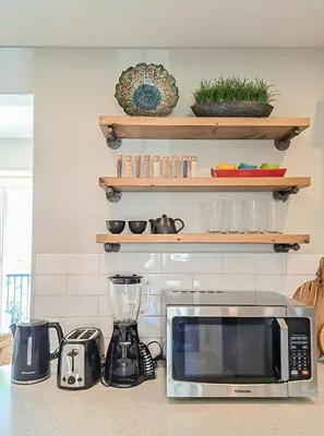 a kitchen counter with a microwave and a blender at EmeraldRidge Retreat - 180 Degree Amazing View & Firepit & BBQ in Chilliwack
