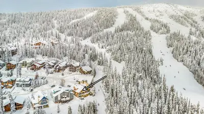 an aerial view of a ski resort in the snow at Fresh Tracks Retreat - Ski In Out Mtn View & Private Hot Tub in Big White