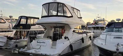a group of boats docked in a harbor at Fly Knots in Vancouver