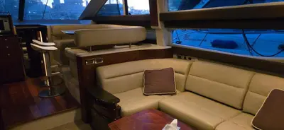 a small room with a couch and a tv at Fly Knots in Vancouver