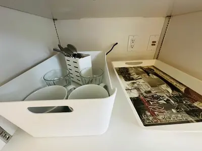 a white box with dishes in it on a table at Cozy Home in Dunbar in Vancouver