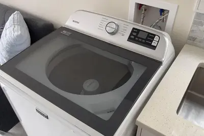 a microwave oven sitting on top of a counter at Modern Spacious 1BR minutes away from Main St in Vancouver