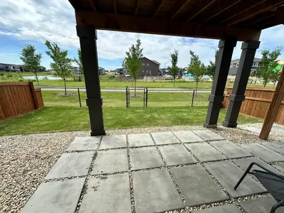 a patio with a view of a park at Juanus Cozy Cove in Edmonton