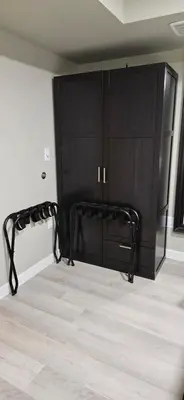 a room with a black cabinet and a floor at 1 block to Kelowna General Hospital 2 blocks to Beach 1km to OUC 1km to Downtown Kelowna 20min to YLW in Kelowna