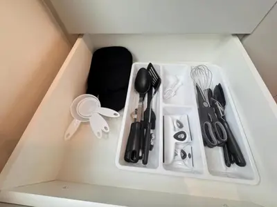 a drawer filled with utensils in a cabinet at RED Mountain Gem in Trail