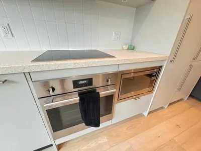 a kitchen with a stove and a counter top at RED Mountain Gem in Trail