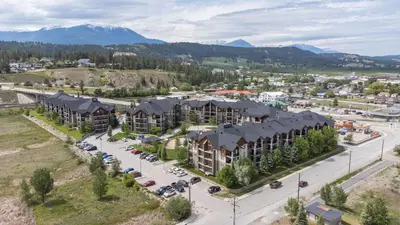an aerial view of a town with buildings and a parking lot at Aspen Retreat in Invermere