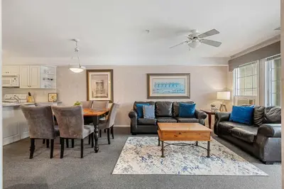 a living room with a couch and a table at Vista in Fairmont Hot Springs