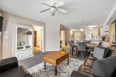 a living room with a couch and a table at Vista in Fairmont Hot Springs