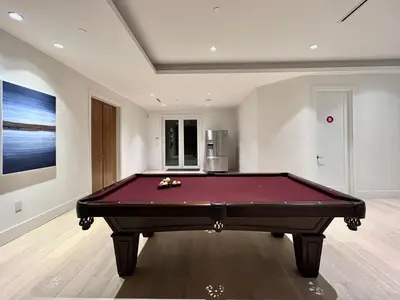 a pool table in the middle of a room at Cozy&Private Suite in Vancouver in Vancouver