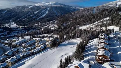 an aerial view of a ski resort in the snow at Powder Heights #25 home in Sun Peaks