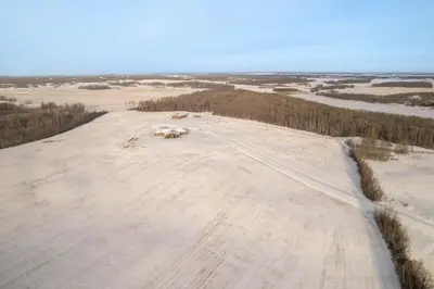 an aerial view of animals laying on a dirt road at Luxurious Modern 11-Bed Home Private 136 Acres in Spruce Grove