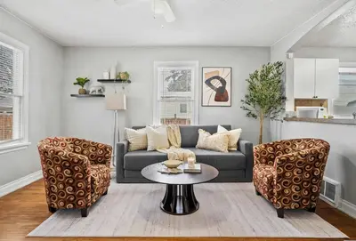 a living room with a couch and two chairs at Sylvan Lake Nook Family-Friendly and Close to Beach in Sylvan Lake