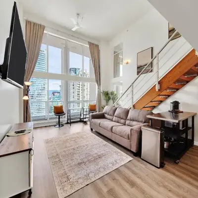 Two-Story Loft with a High-rises view and Rooftop Deck