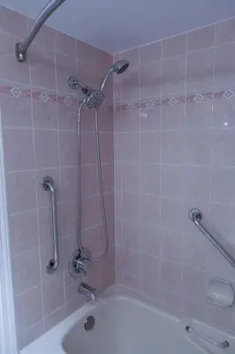 a bathroom with a shower and a bath tub at 1BR next to slopes on Blackcomb w pool & hot tub in Whistler