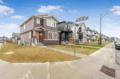 a house with a street sign in front of it at Private Master Bed Room SPRING in Edmonton