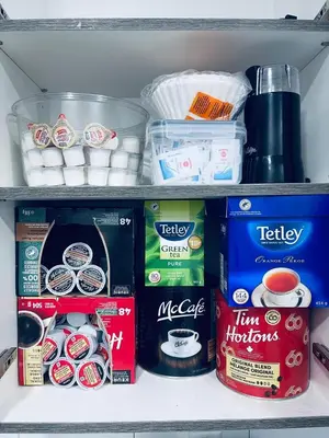 a refrigerator shelf filled with various food items at Modern 2 bedroom guest suite in Calgary