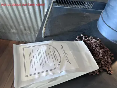 a plate of food sitting on a table with coffee beans at Sagebrush Caboose in Okanagan Falls