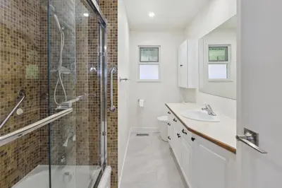 a bathroom with a shower and a sink at Lionsbay in Lions Bay