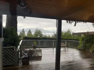 a view of a deck from a house at Lionsbay in Lions Bay