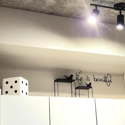 a wall with a sign that says life is beautiful at Luxurious Downtown condo with spectacular views in Calgary