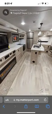 a large kitchen with a sink and a counter top at Luxury Rocky Mountain Glamping in Golden Canada Family Friendly AC Campfire Northern Lights Stargazing in Golden