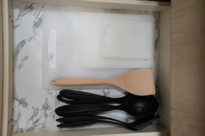 a drawer with a knife and other utensils in it at Modern & Cozy Home in the Heart of Downtown Vancouver in Vancouver