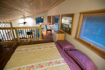 a bedroom with two beds in a room at Jordan River Coastal Cottage in Shirley