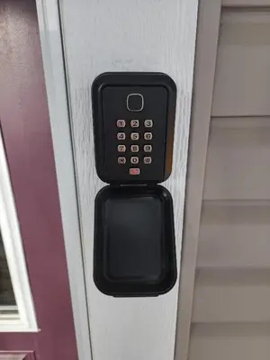 a close up of a remote control in a room at Cozy Luxury House in Edmonton