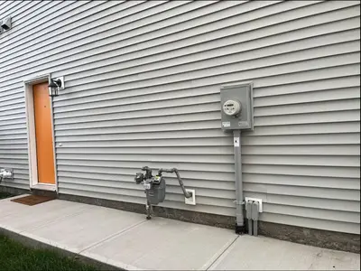 a fire hydrant on the side of a house at Super luxury suite in Edmonton