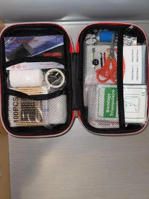 a suitcase filled with various items on a shelf at 2Bed Bright & Stylish Ritchie Urban Retreat in Edmonton
